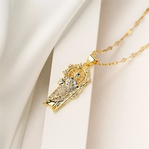 Detailed macro view of 18K gold plated pendant necklace with sparkling zircon crystals