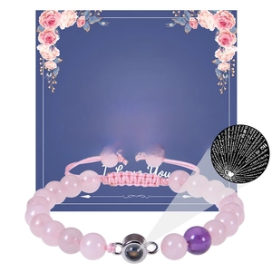 Bracelet tressé rose ajustable avec pierre de projection et perles de quartz rose