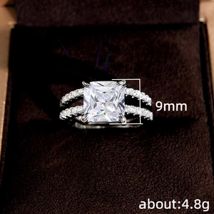 Sparkling silver square-cut 9mm crystal engagement ring set with double row side stones