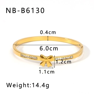 Detailed view of 18k gold plated stainless steel bow bangle with zircon size specifications