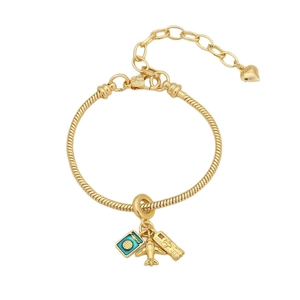 Gold snake chain bracelet with passport airplane and suitcase travel themed charms