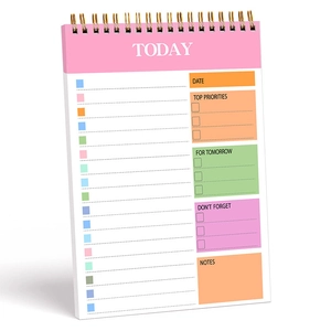Minimalist spiral daily planner with colorful functional sections and priority checklists