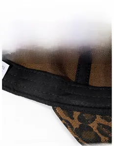 Macro detail of leopard print cotton baseball cap with wide sweatband and stitching