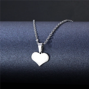 Minimalist silver heart pendant necklace with polished finish and delicate O-chain