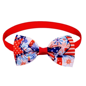 Detail of Independence Day pet bowtie with American flag stars and stripes pattern on grosgrain