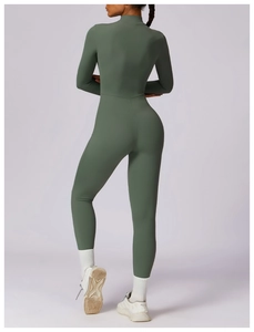 Slim fit dark green long sleeve yoga bodysuit showing the back contour and waist detail