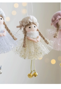Detail of champagne angel ornament with sequined mesh skirt and golden bells
