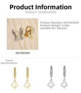 Close-up of 14K gold plated hollow cross star charm earrings showing the clasp and 0.88g weight