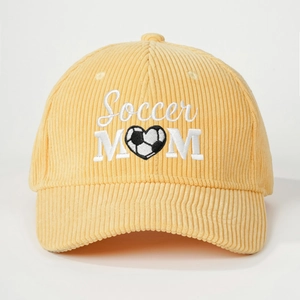 Yellow corduroy baseball cap with Soccer Mom embroidery and heart football graphic