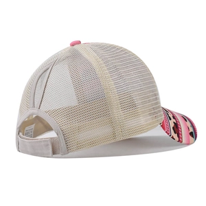 Detail of high ponytail opening and adjustable velcro strap on leopard print baseball cap