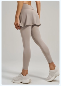 Close-up of high-waist 2-in-1 yoga leggings with skirt and high-elastic fabric detail