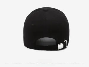 Rear detail of black cotton baseball cap showing adjustable strap and silver metal buckle