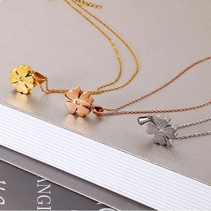 Three-color titanium steel clover necklaces with brushed finish and zircon inlay