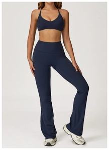 Detail shot of high-waisted navy yoga flare leggings with supportive fabric texture