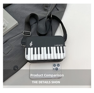Close-up of leather piano key bag with I LOVE MUSIC print and treble clef detail