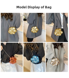 Detail view of flower shaped metallic chain bags in gold, blue, and orange finishes