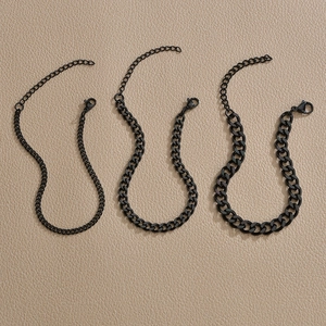 Three widths of matte black stainless steel curb chain bracelets with lobster clasps