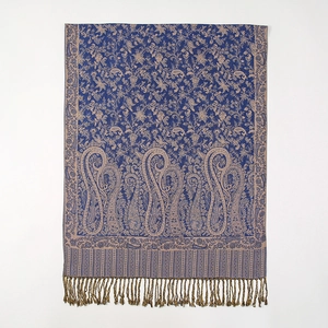 Close-up of navy and gold paisley cashmere-feel scarf with detailed fringe edges