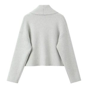 Detailed back view of light gray knit cardigan featuring drop shoulders and wide lapel collar