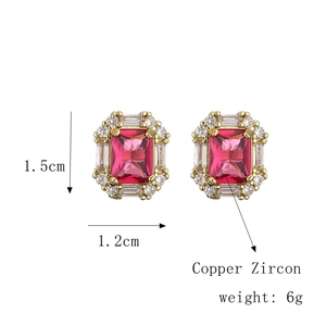 Detailed view of pink zircon earrings in copper gold finish with size and material specs