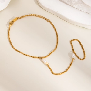 Bracelet bague élégant en acier inoxydable doré avec perles blanches et chaîne intégrée