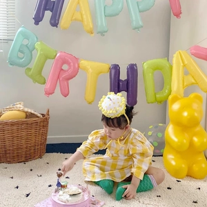 Kids yellow cake birthday headband with soft pompoms for festive party celebration