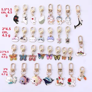 Detailed size chart for colorful cartoon animal enamel keychains in various shapes