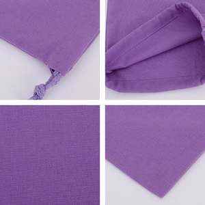 Detail view of purple cotton drawstring bag showing fabric texture and drawstring closure