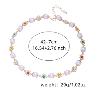Detail shot of pearl and colorful rhinestone flower necklace with size specifications