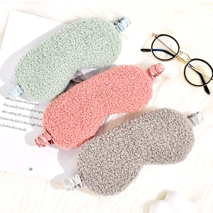 Plush teddy fleece sleep masks in mint, pink, and grey with elastic satin straps