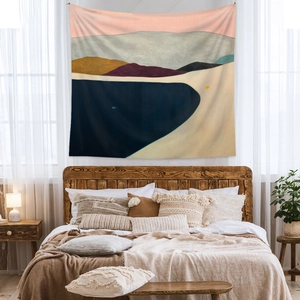 Detailed view of bohemian landscape tapestry hanging as an aesthetic bedroom wall decor