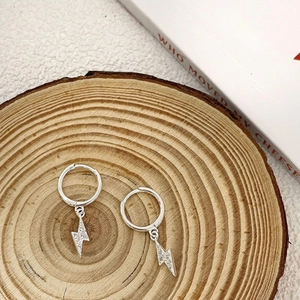 Silver hoop earrings featuring sparkling lightning bolt pendants with fine diamond accents