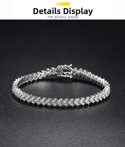 Detail showing high-quality Moissanite tennis bracelet with secure box clasp closure