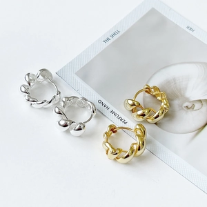 Elegant 925 sterling silver twisted rope hoop earrings in polished gold and silver finishes