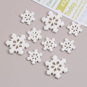 DIY white glitter snowflake resin charms for Christmas crafts in small and large sizes
