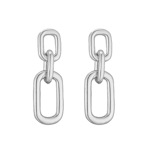 Detailed close-up of geometric silver chain earrings with three nested rectangular links