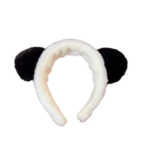 Cute panda plush headband with black and white ears for face washing and makeup
