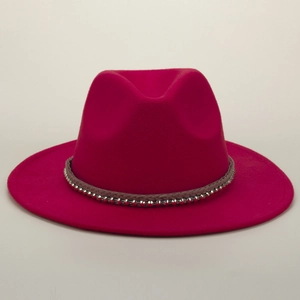 Magenta woven fedora hat with gold sequins and metal studs on a brown decorative band