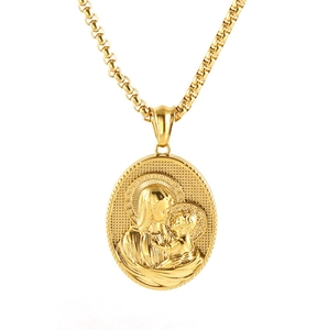 Macro view of 3D embossed religious pendant on golden box chain with matte finish