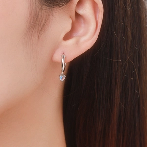 Elegant S925 sterling silver heart-shaped moonstone hoop earrings for women worn by model