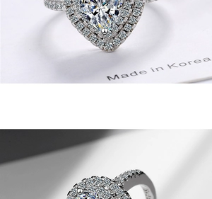 Macro view of heart-cut crystal ring with double-layer micro-paved sparkling zircon stones