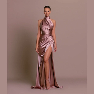 Elegant sleeveless halter neck satin gown with high slit in dusty rose pink color