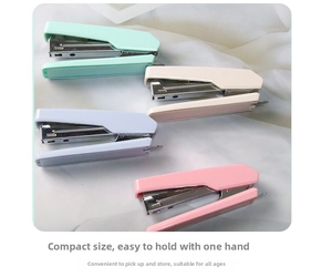 Top view of compact macaron-colored staplers in mint, cream, purple, and pink tones