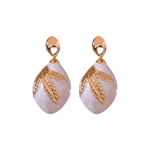 Elegant rose gold leaf earrings with white marble resin drop on a white background