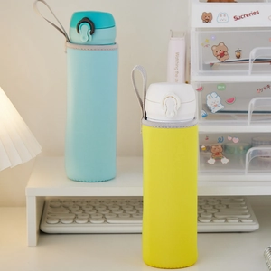 Detail of portable neoprene cup sleeves with handles in light blue and yellow colors