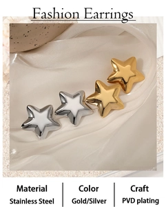 Detailed close-up of gold and silver star earrings on white silk with PVD plating details