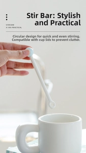 White ceramic stirring rod with blue ball top for minimalist mugs and office coffee cups