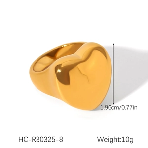Macro detail of golden heart croissant ring showing 1.96cm height and polished finish
