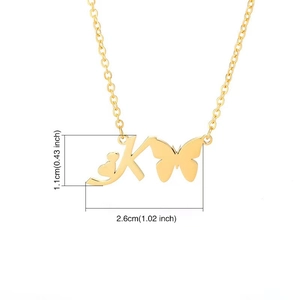 Golden stainless steel necklace featuring a butterfly with letter K and heart pendant