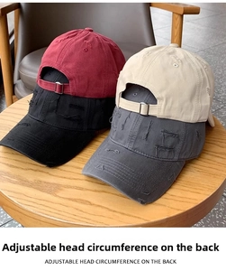 Detail of adjustable metal buckle and distressed fabric on cotton baseball caps
